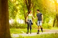 Couple ride rollerblades Royalty Free Stock Photo