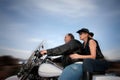 Couple riding a motorcycle