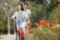 Couple riding tandem bicycle in Beijing Royalty Free Stock Photo