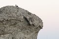 Couple on the rock, beach of Mosul