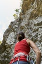 Couple of rock climbers on a wall