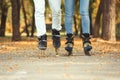 Couple roller skating in autumn park Royalty Free Stock Photo