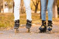 Couple roller skating in autumn park Royalty Free Stock Photo