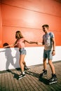 A couple roller-skating at sunset Royalty Free Stock Photo