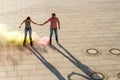 Couple rollerblading in the street Royalty Free Stock Photo