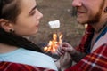 Couple romance nature picnic marshmallows concept. Royalty Free Stock Photo