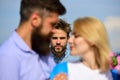 Couple romantic date lovers flirting. Couple in love happy dating, jealous man watching woman prefers another macho Royalty Free Stock Photo