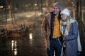 Couple in romantic moments on a magical night on a snowy weather in the city. Love, together, walk, snow, city