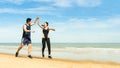Couple runners jump and touch hands And congratulate when able to practice according to the exercise program Royalty Free Stock Photo