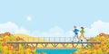 Couple running on bridge in autumn