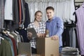 Couple Running On Line Clothing Store Packing Goods For Dispatch Royalty Free Stock Photo