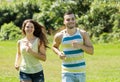 Couple running outdoor in summer Royalty Free Stock Photo