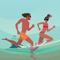 Couple running in shallow water