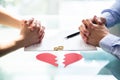 Couple`s Hand On Divorce Paper Royalty Free Stock Photo