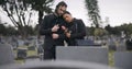 Couple, sad and mourning at tomb of graveyard, funeral and pay respect together outdoor. Death, grief and man and woman Royalty Free Stock Photo