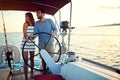 Couple sailing on the luxury boat together and enjoy at sunset Royalty Free Stock Photo