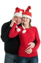 Couple with Santa hats Royalty Free Stock Photo