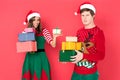 Couple in santa hats with gifts Royalty Free Stock Photo