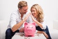 Couple saving money to buy house Royalty Free Stock Photo