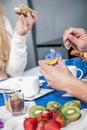 Couple seated eating breakfast Royalty Free Stock Photo