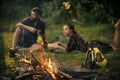 Couple secrets fantasy. Bonfire flame burn and blurred man woman relax on nature