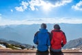 A couple is seeing the scenery of Mount Tsubakuro Dake at sunset. Mountain range of Norther Japan Alps Chubu-Sangaku Park Royalty Free Stock Photo