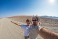 Couple selfie in the desert, Namib Naukluft National Park, Namibia road trip, travel destination in Africa. Royalty Free Stock Photo