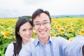 Couple selfie with sunflower