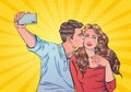 Couple of lovers take a selfie on the camera of their phone.