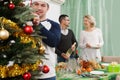 Couple serving festive table Royalty Free Stock Photo
