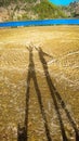Couple shadow on beach, sunset lighting. Mediterranean Sea, Turkey. Royalty Free Stock Photo
