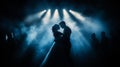 Couple sharing an intimate moment on the dance floor with dramatic blue lighting and smoke Royalty Free Stock Photo