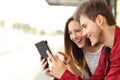 Couple sharing media content from a tablet