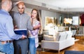 Couple shocked from looking through price-list