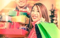 Couple shopping Christmas presents in mall Royalty Free Stock Photo