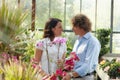 Couple shopping in garden center Royalty Free Stock Photo