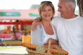 Couple shopping at the market Royalty Free Stock Photo