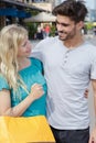 Couple shopping outdoors during summer time Royalty Free Stock Photo