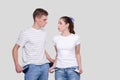 Couple Showing Empty Pockets Looking at Each Other. Family Budget. No Money, No Cash, Poor Concept. Royalty Free Stock Photo