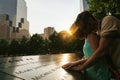 Couple Showing Respect to the Victims in the National September 11 Memorial