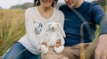 Couple showing a stuffed bunny