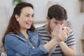 couple showing their emotions to pregnancy test results Royalty Free Stock Photo