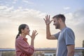 Couple showing words mother and father in the language of the deaf