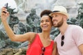 Couple sight seeing in destination city doing selfie Royalty Free Stock Photo