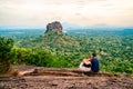 Couple in Sigiriya, rock view. Woman and man, summer travel. People on vacation in Sri Lanka. Royalty Free Stock Photo