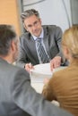 Couple signing contract at lawyer's office Royalty Free Stock Photo