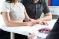 Couple signing contract. Legal document, health insurance. Royalty Free Stock Photo