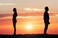 Couple Silhouette Standing Away From Each Other Royalty Free Stock Photo