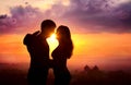 Couple silhouette at sunset Royalty Free Stock Photo