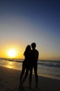 Couple silhouette on sunset ocean Royalty Free Stock Photo